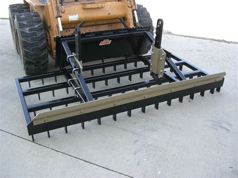 dirt rake skid steer|rake attachment for skid steer.